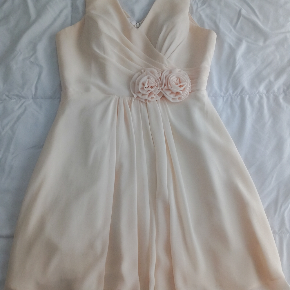 Elegant Cream Dress with Floral Detail